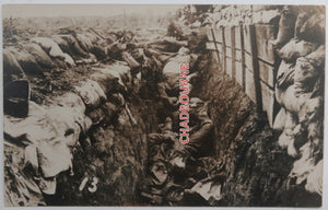 WW1 photo postcard, dead in trench