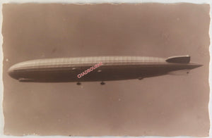 c. 1930 German postcard photo of LZ-127 Zeppelin in flight