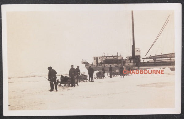 c. 1920s Canada photo unloading ship stuck in winter ice