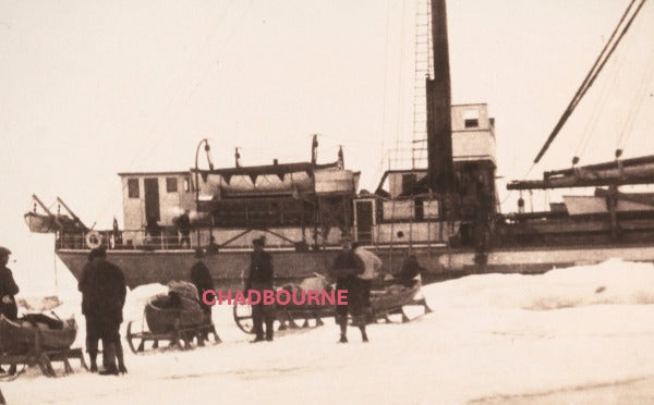 c. 1920s Canada photo unloading ship stuck in winter ice