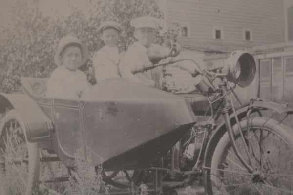 C. 1910s USA photo postcard 3 children in an Indian  motorcycle sidecar