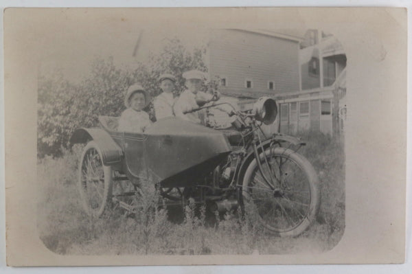 C. 1910s USA photo postcard 3 children in an Indian  motorcycle sidecar