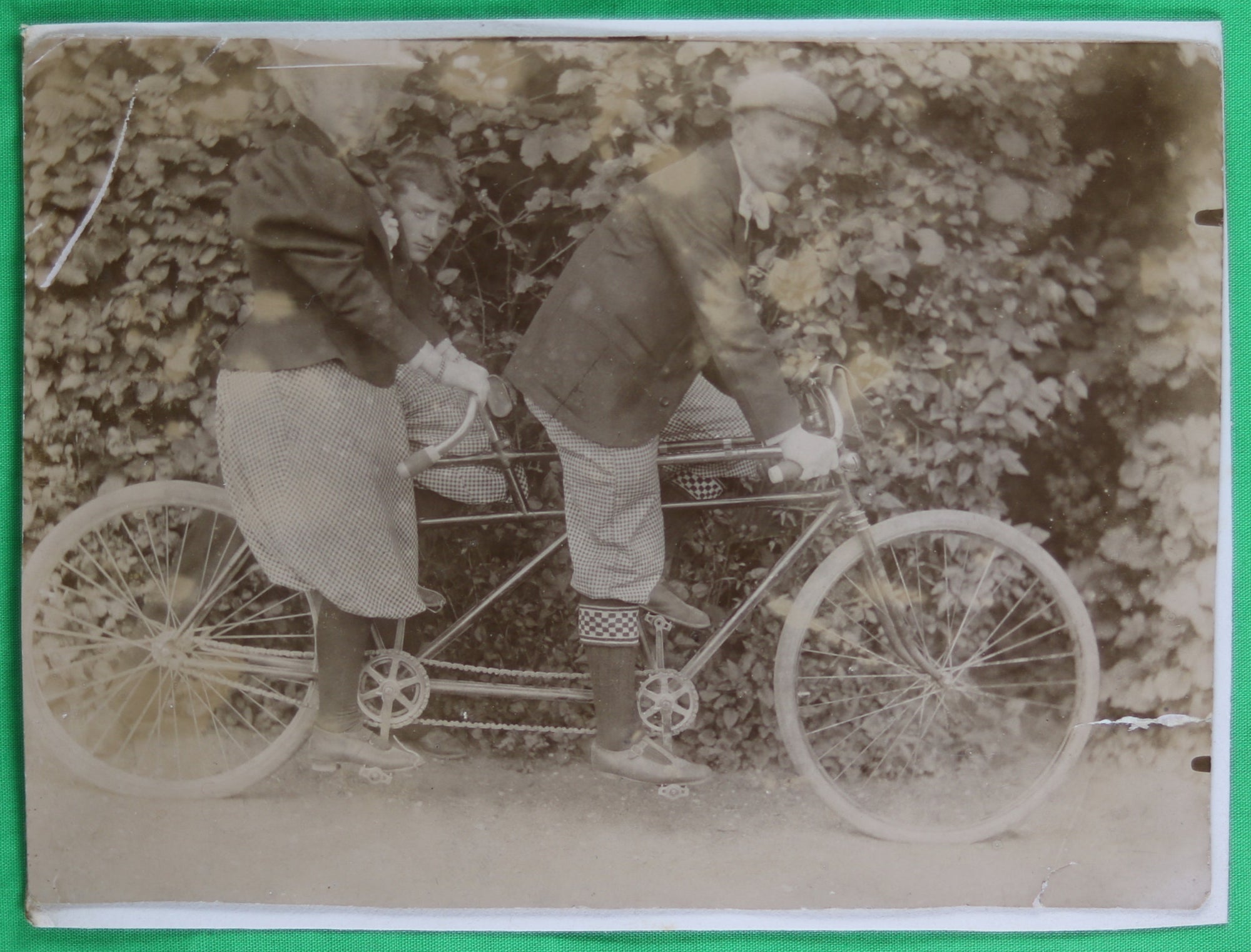 @1900s vintage photo man and woman tandem bicycle