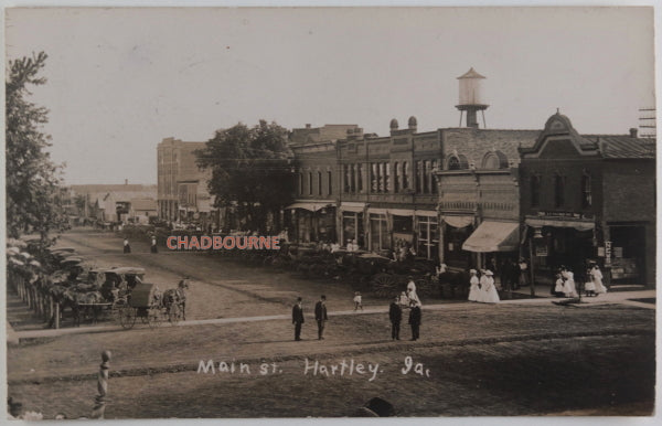 1910 photo postcard horses and carriages Main St. Hartley Iowa