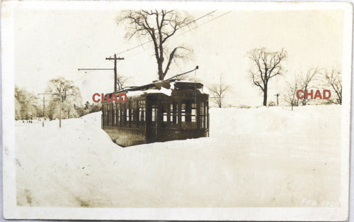 1920 RPPC photo postcard of electric trolley car in snow Newbury MA