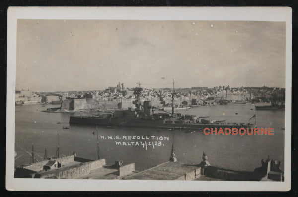 1923 photo postcard of HMS Resolution in port at Malta