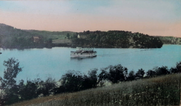 1931 calendar with image of passenger boat going along river (USA)