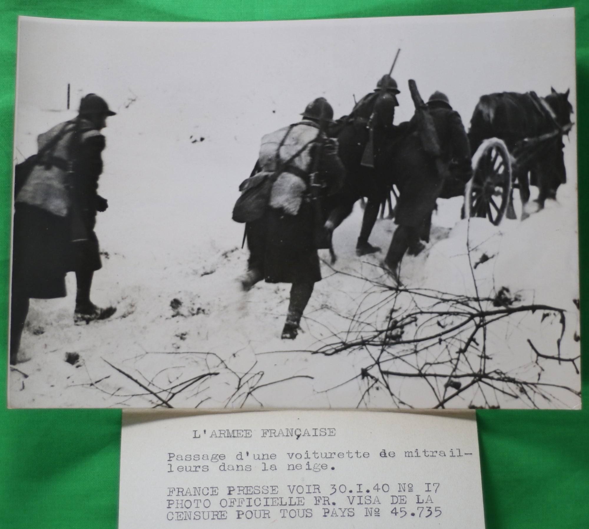 1940 Photo Presse (France) passage d’une voiturette de mitrailleurs