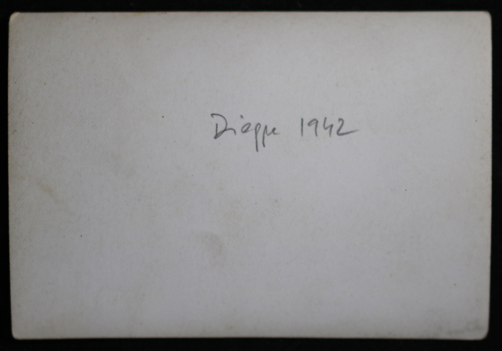 1942 WW2 photo of Canadian POWs carrying stretcher at Dieppe