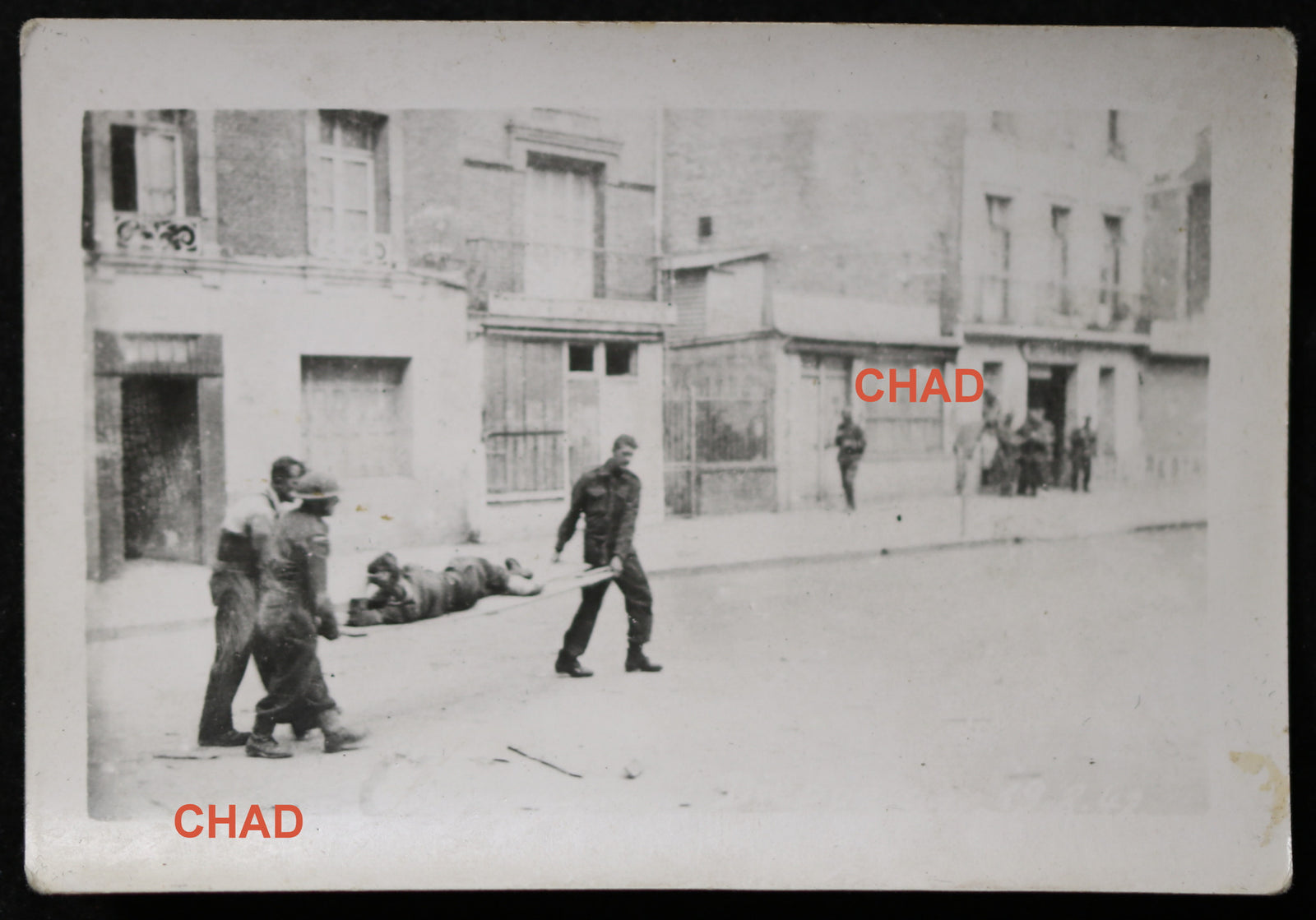 1942 WW2 photo of Canadian POWs carrying stretcher at Dieppe