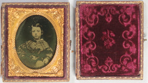 Ambrotype photo of child wearing tartan c. 1860s