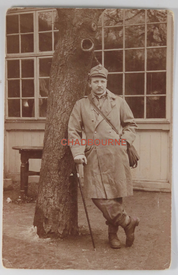 Austria photo postcard of soldier leaning on tree c. WW1