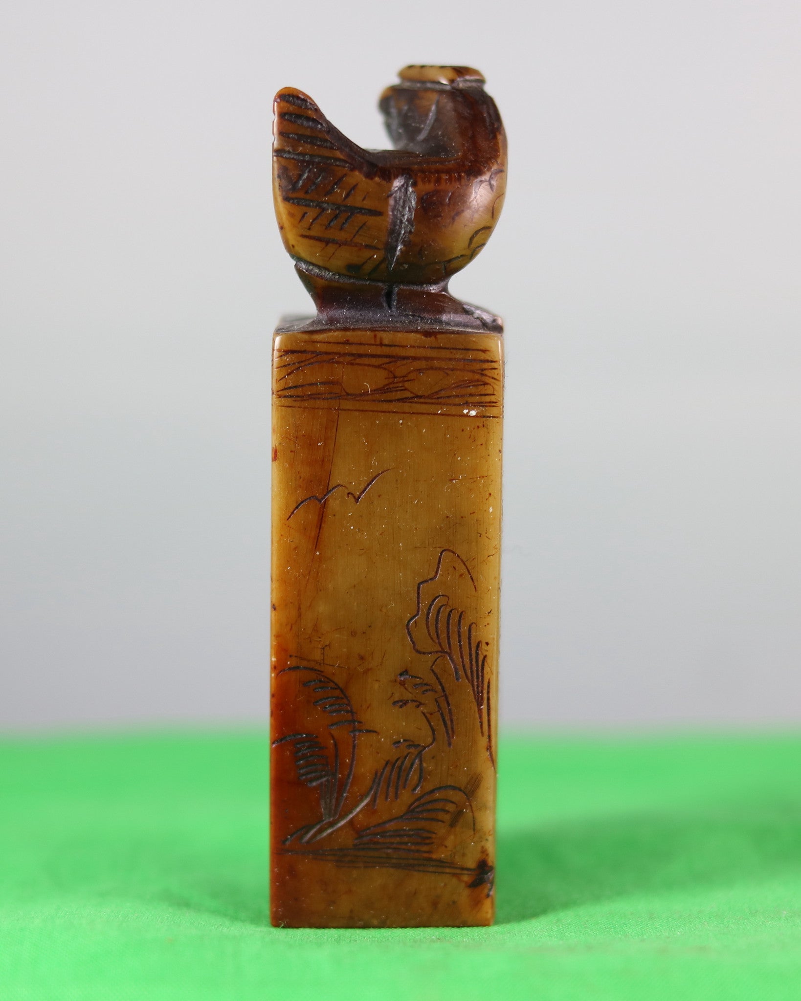 Carved Chinese seal with rooster on top