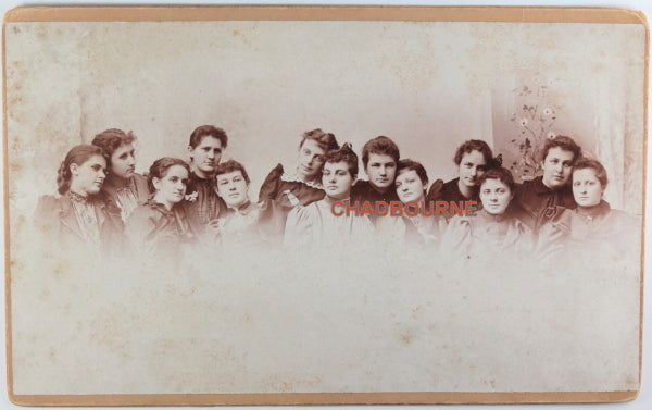Early 1900s photo of 12 girls in dresses