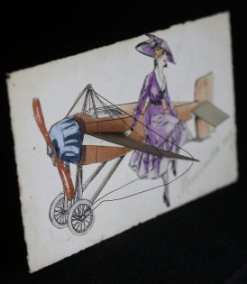 Early 1920s postcard of plane with flip-out wings
