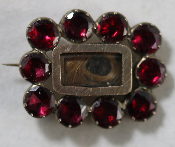 Georgian-era garnet brooch with lock of hair