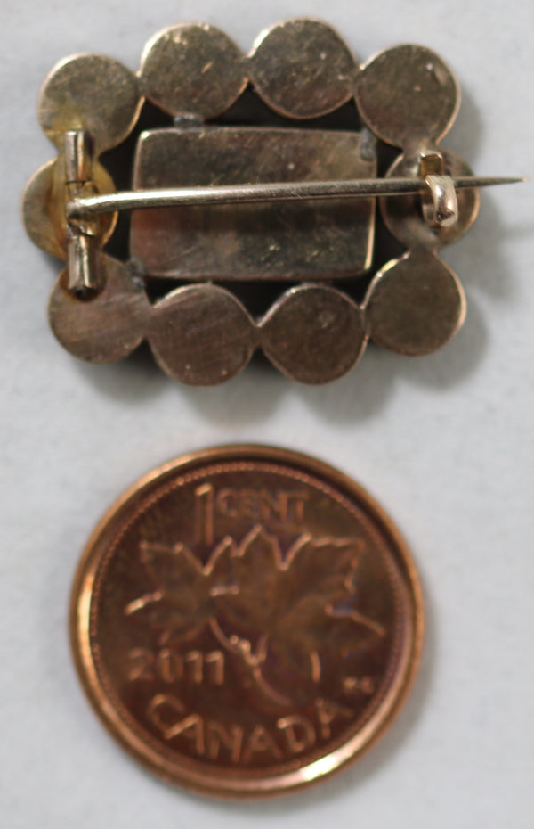 Georgian-era garnet brooch with lock of hair