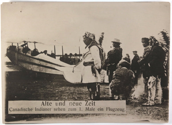 German photo "old meeting the new" Canadian aboriginals and biplane