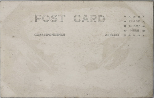 Photo postcard of American-Indians in headdress c. 1920s