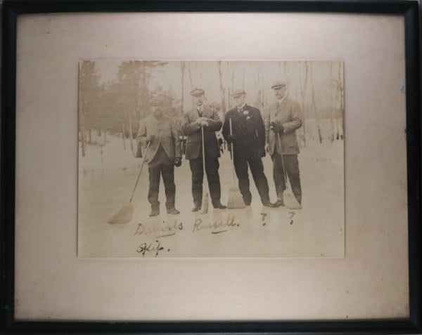 Photo of curling team posing on outdoors sheet, New York c. 1930s