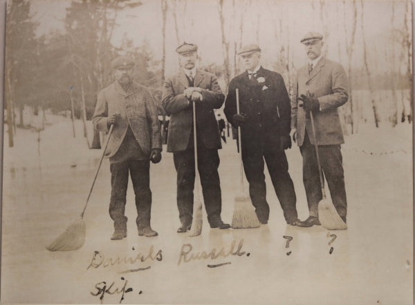 Photo of curling team posing on outdoors sheet, New York c. 1930s