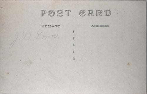 Photo postcard of US soldiers posing at bivouac c. WW1