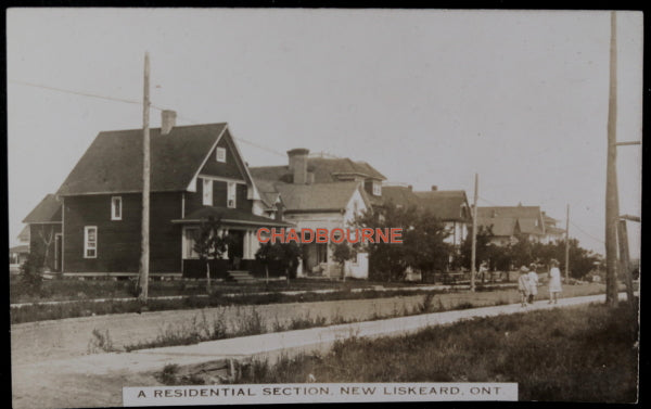 Photo postcard residential street New Liskeard Ontario c. 1910s