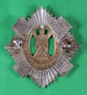 'The Royal Scots' regimental cap badge