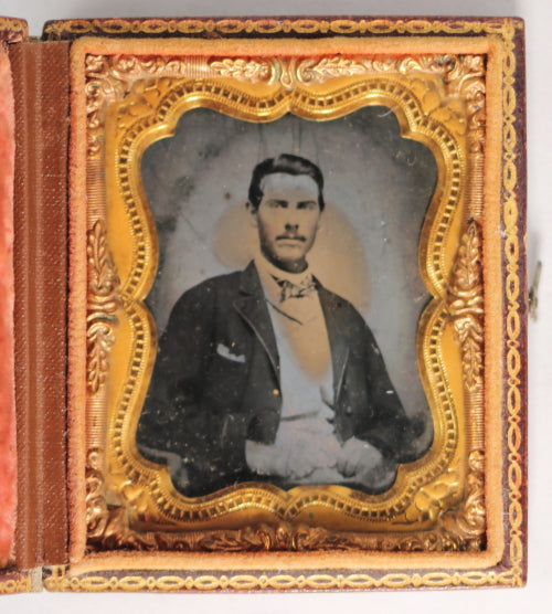 Tintype photo of young gentleman with bow tie @1860s