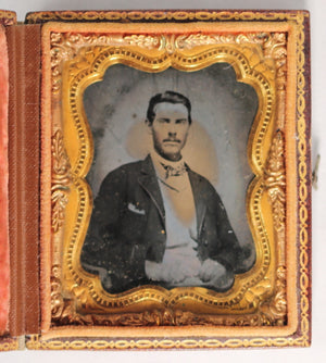 Tintype photo of young gentleman with bow tie @1860s