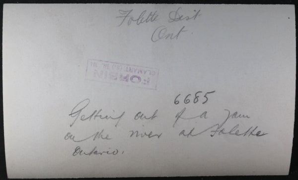 Two photos log drivers riding logs downriver, Foleyet Ontario c.1930