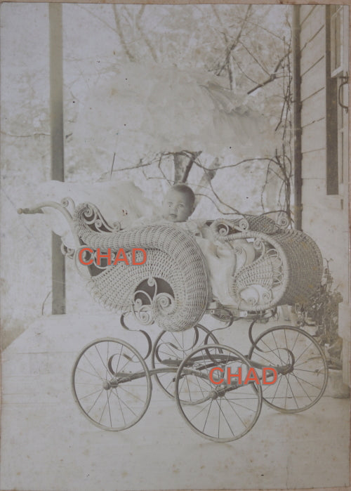 Vintage photo of baby in very fancy stroller, Victorian
