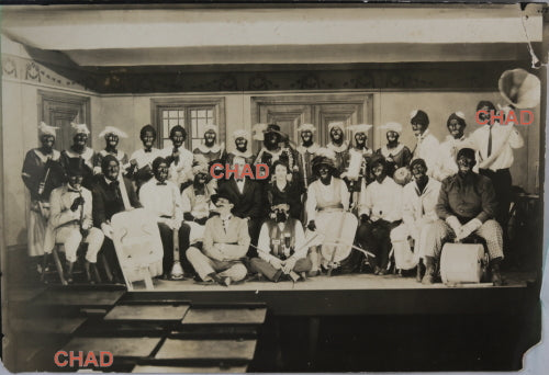 Vintage photo of black-face minstrel performers on stage USA