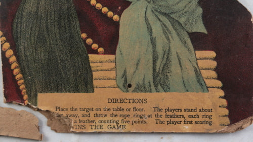 Vintage table-top game piece involving cardboard aboriginal image