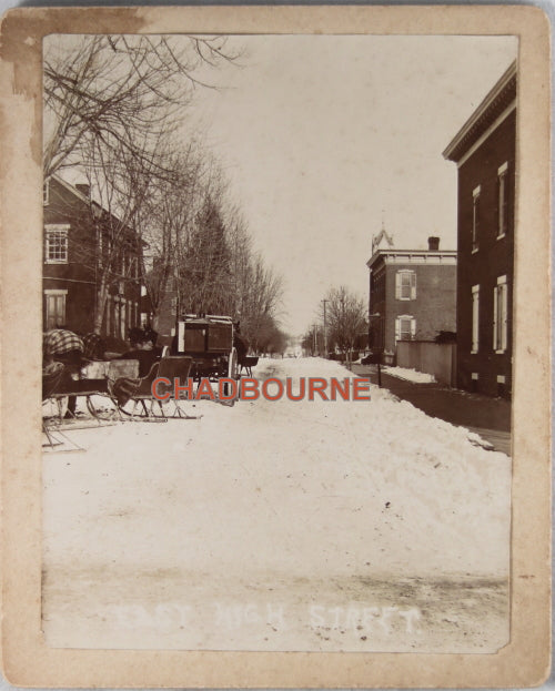 Vintage winter photo horse-drawn sleighs and wagon, small town c.1900