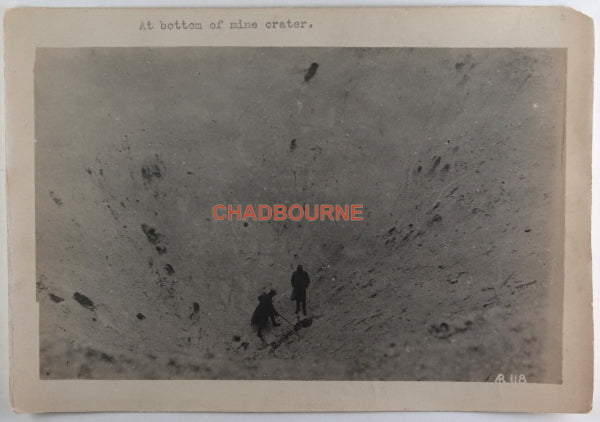 WW1 France, photo of two soldiers in large mine crater