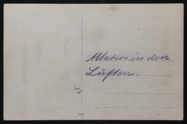 WW1 photo postcard of German Albatros D. biplane in flight c. 1917