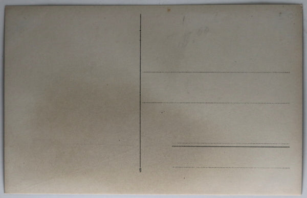 WW1 photo postcard of German war dead near trenches