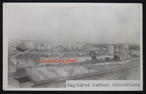 WW1 two photo cards, captured German sub, and French mass burial