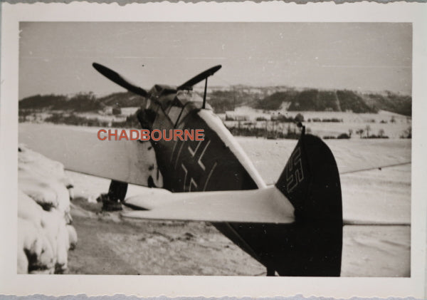 WW2 1940 winter photo of German Messerschmidt parked at grass airfield