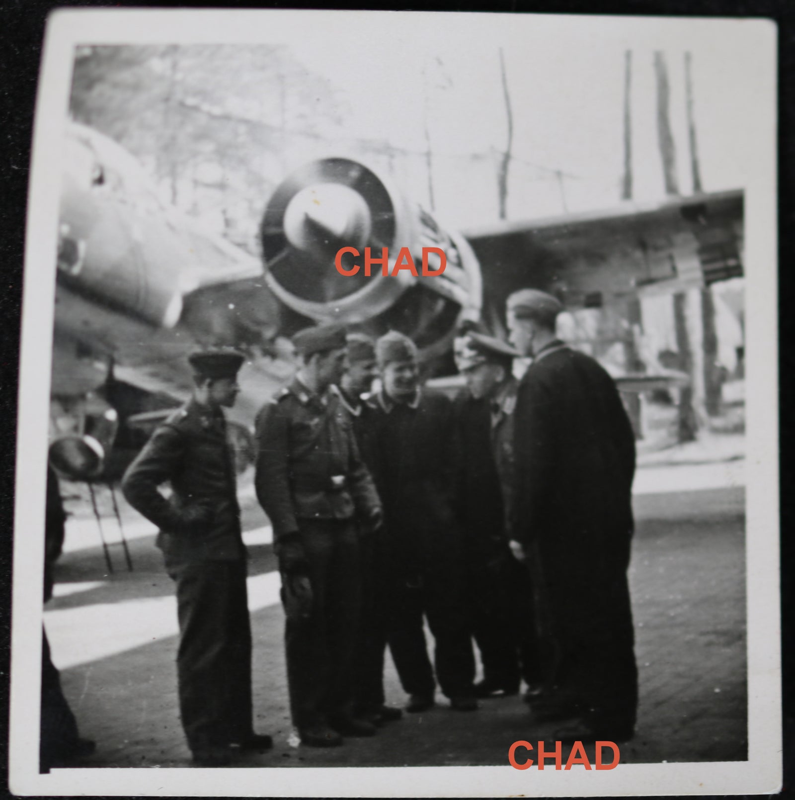 WW2 German photo of pilots and officer beside plane