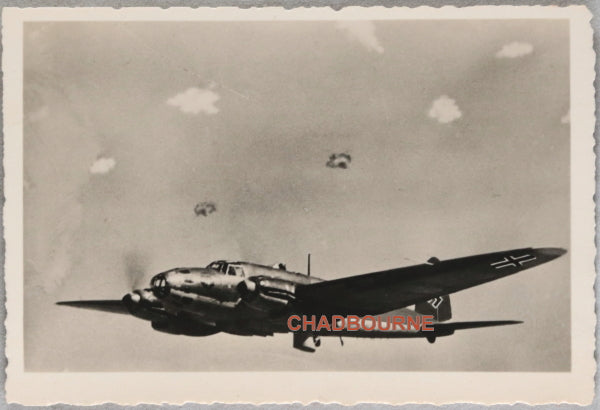 WW2 Propaganda photo of German Heinkel 111 bomber in flak