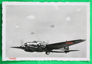 WW2 Propaganda photo of German Heinkel He 111 flying through flak