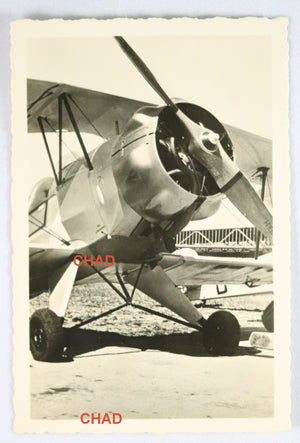 WW2 Propaganda photo of a German Bücker Bü 133 trainer on runway