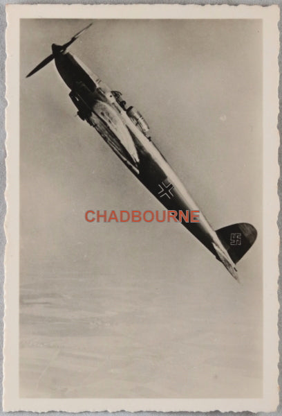 WW2 Propaganda photo of a German Heinkel He 70 plane climbing