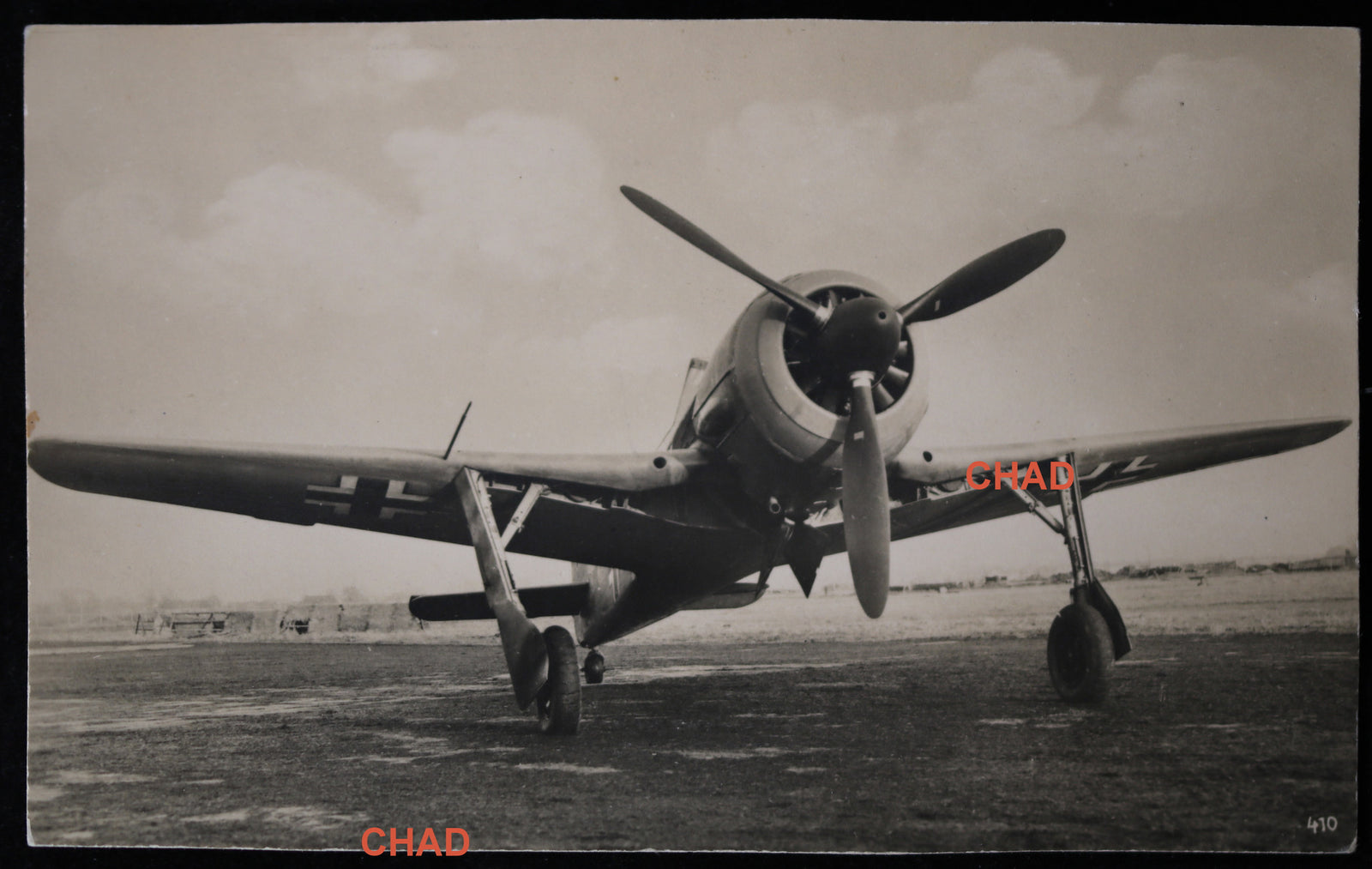 WW2 photo postcard of German Fw 190 fighter plane on tarmac