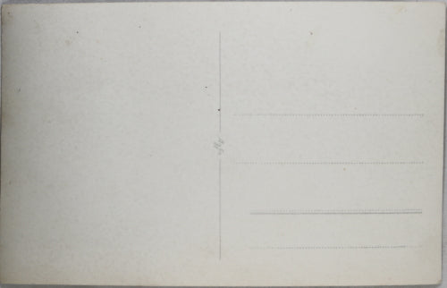 WW2 photo postcard of workers in front of stage, German officer