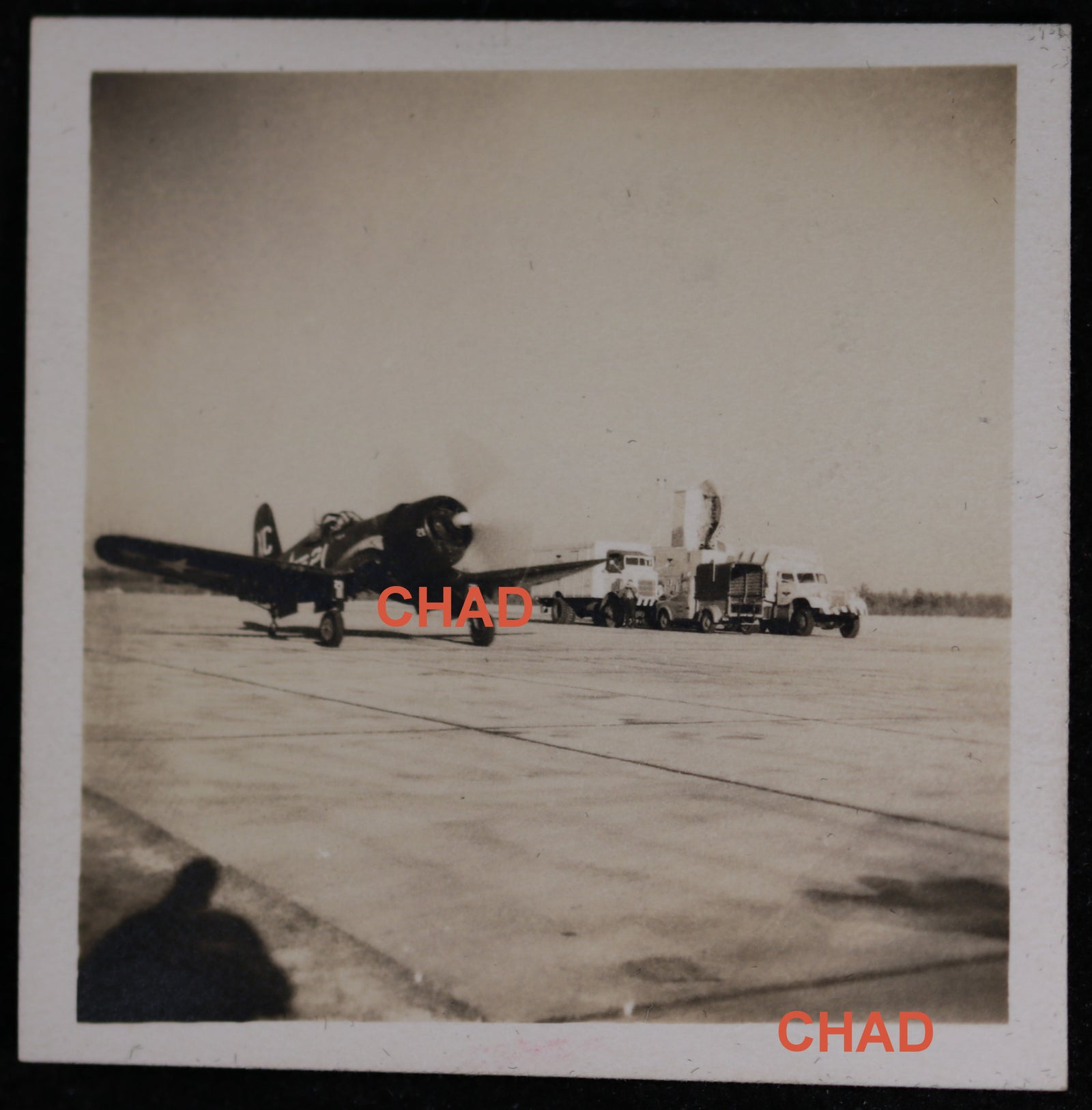 WW2 two photos of American fighter plane taxing on tarmac